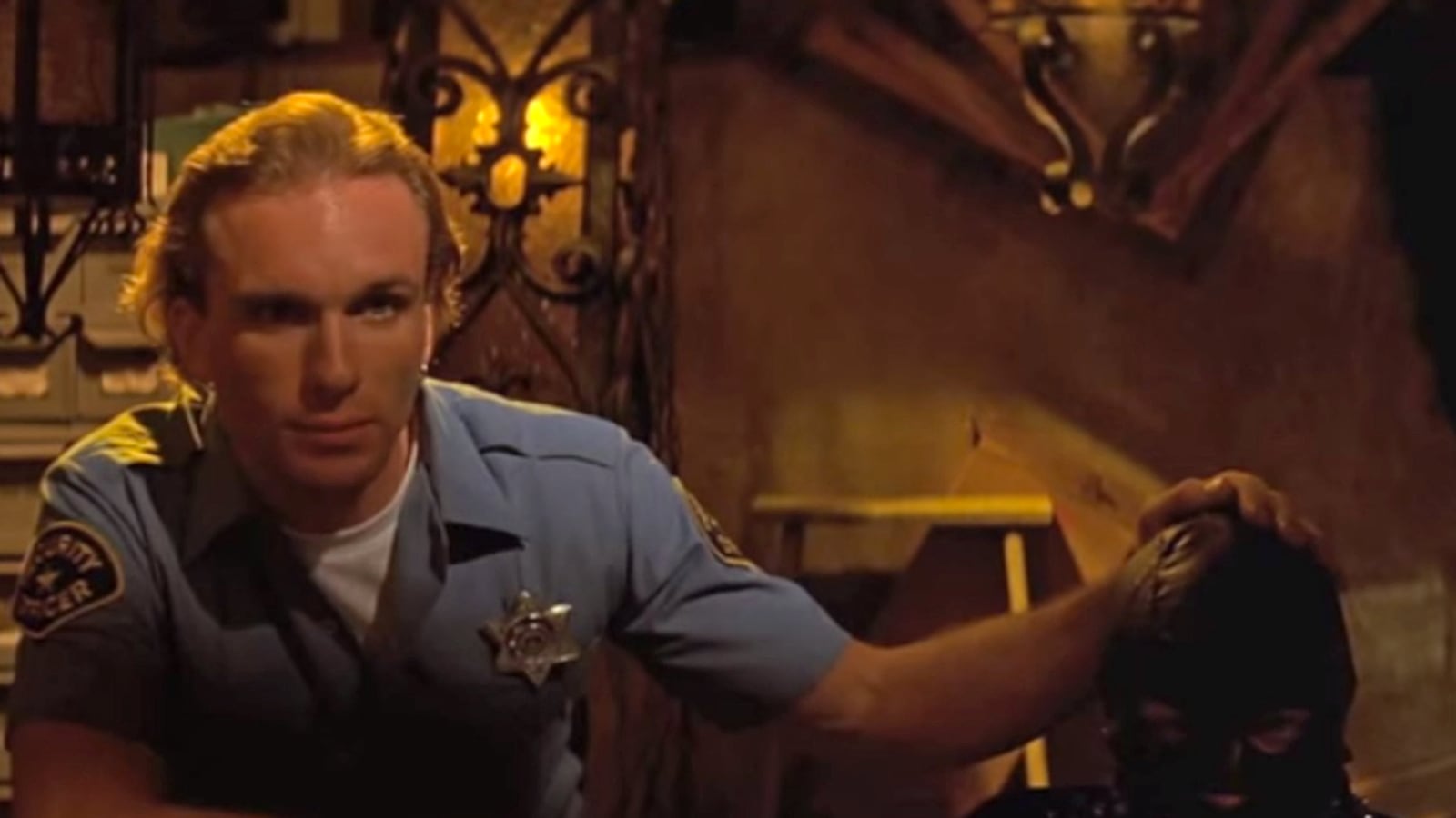 articles/2014/06/30/how-mrhandcuffs-ended-up-with-two-corpses-in-suitcases/140628-daly-cop-suitcase-bodies-tease_daaqvu