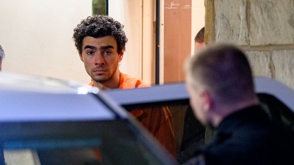 Suspected shooter Luigi Mangione is led from the Blair County Courthouse after an extradition hearing December 10, 2024 in Hollidaysburg, Pennsylvania.