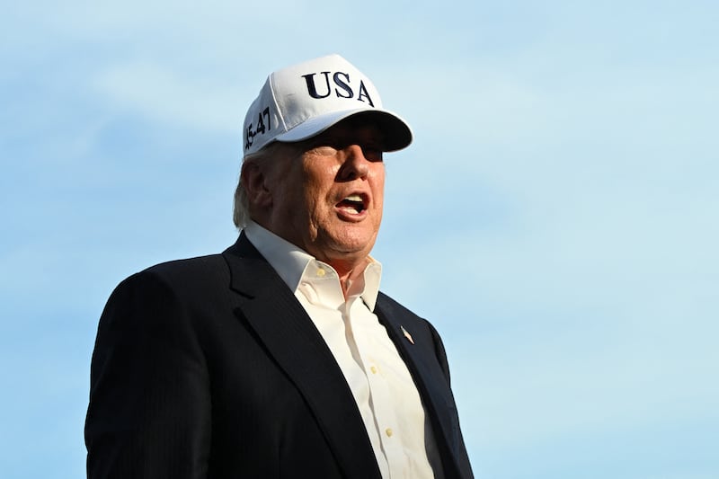 President Donald Trump speaks to reporters after arriving on the South Lawn of the White House in Washington, DC, on May 15, 2026.