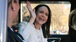 María Corina Machado leaves the White House.