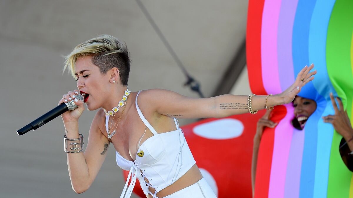 articles/2013/10/04/sinead-o-connor-writes-miley-cyrus-another-letter-britney-spears-thinks-her-video-was-too-sexy/miley_cyrus_cheat_tease_tqtf3e