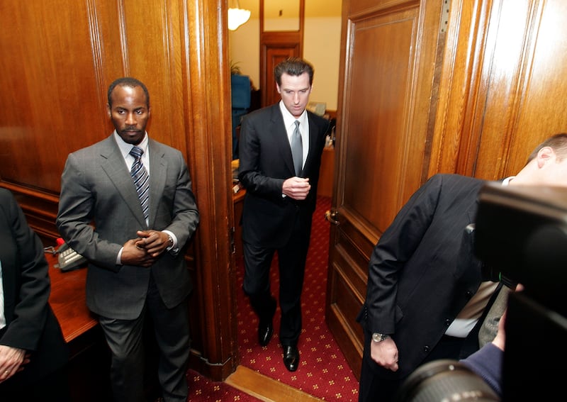 SAN FRANCISCO - FEBRUARY 01:  San Francisco Mayor Gavin Newsom emerges from his office to speak at a press conference February 1, 2007 in San Francisco. Mayor Newsom admitted to an affair with Ruby Rippey-Tourk, the wife of his re-election campaign manager Alex Tourk who resigned yesterday after learning of the affair.  (Photo by Justin Sullivan/Getty Images)