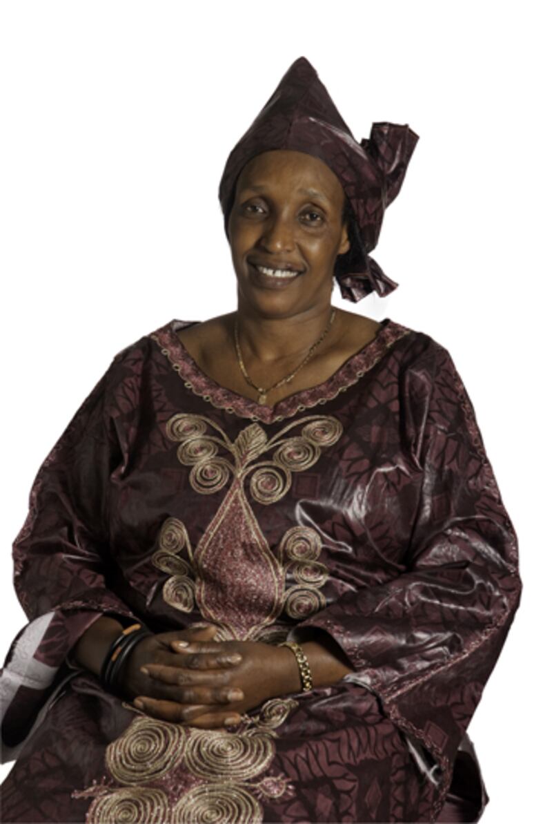 galleries/2012/03/05/congolese-refugee-portraits-photos/congolese-refugees-aubergine-dress_m1najw