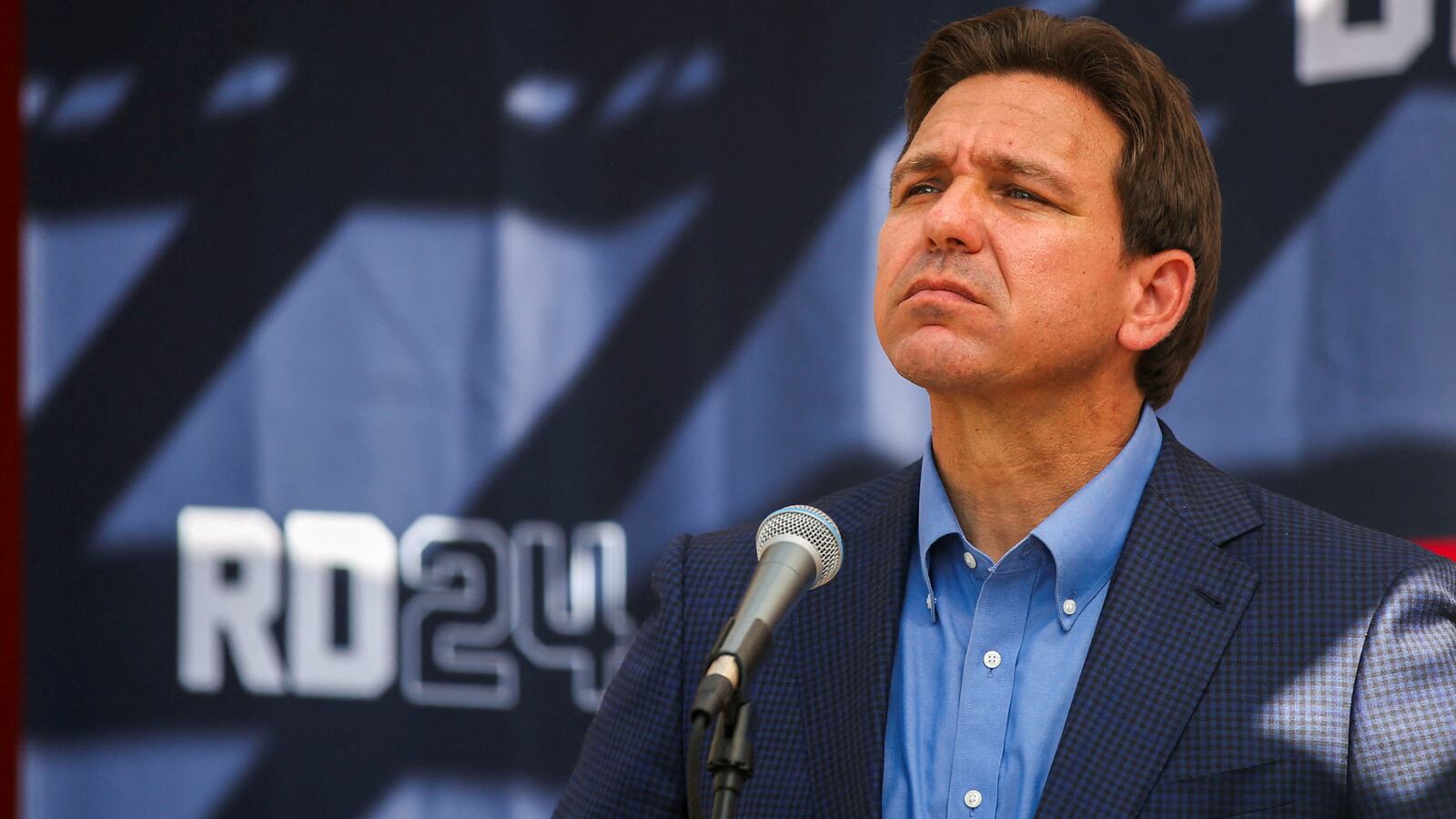 Ron DeSantis attends a barbecue hosted by former diplomat Scott Brown, as part of his “No B.S. Backyard BBQ” series, in Rye, New Hampshire, July 30, 2023.