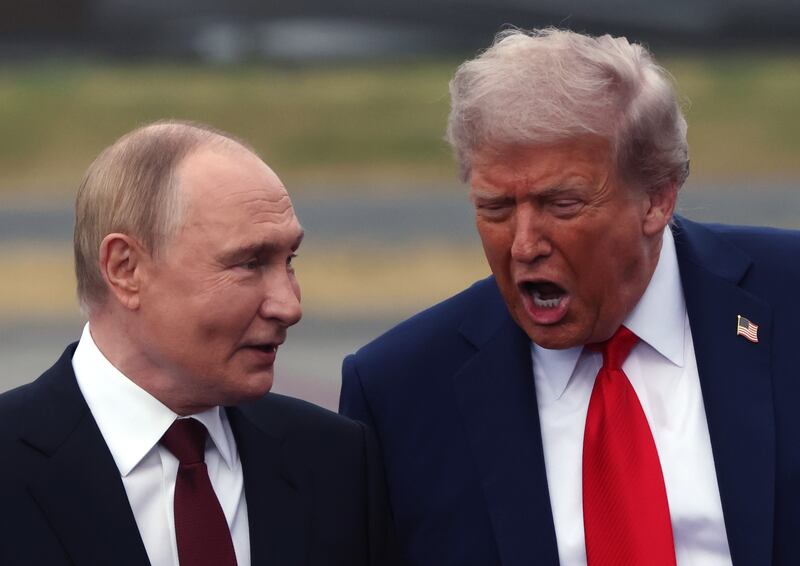 President Donald Trump welcomes Russian President Vladimir Putin to Joint Base Elmendorf-Richardson on August 15, 2025 in Anchorage, Alaska.
