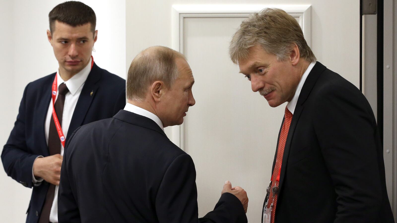 Vladimir Putin and Dmitry Peskov