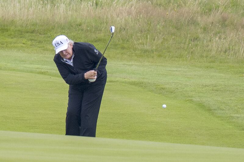 Trump plays golf at his Turnberry golf course during his five-day private trip to the country. The 79-year-old president complained about seeing windmills “on the horizon.”