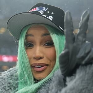 DENVER, COLORADO - JANUARY 25: Artist Cardi B poses for a photo following the AFC Championship Playoff game against the Denver Broncos at Empower Field At Mile High on January 25, 2026 in Denver, Colorado. The New England Patriots defeat the Denver Broncos 10-7. (Photo by Matthew Stockman/Getty Images)