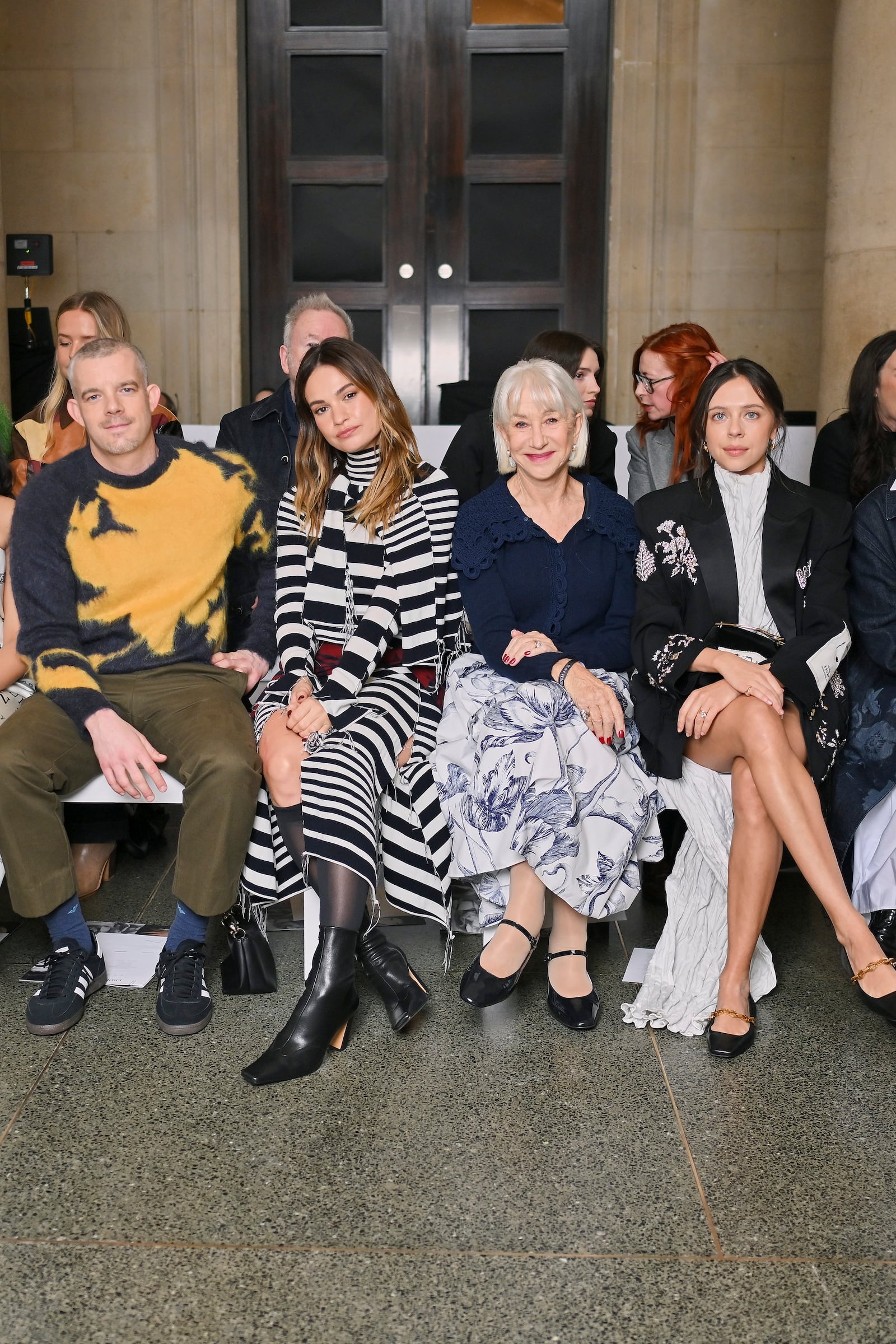 Russell Tovey, Lily James, Helen Mirren, and Bel Powley sit front row at the Erdem show during London Fashion Week at the British Museum on February 22, 2026.