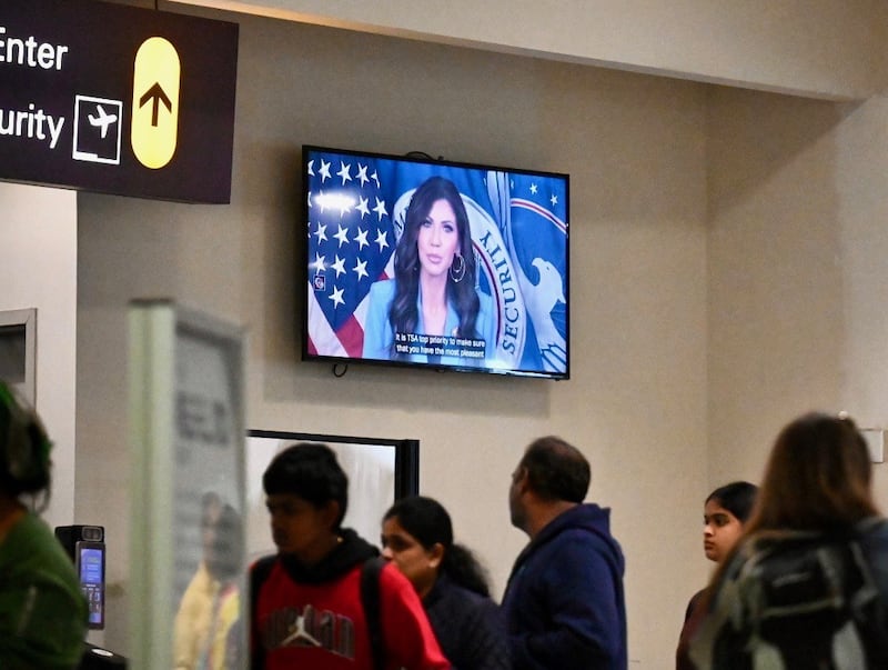 A video of Homeland Security Secretary Kristi L. Noem in an airport