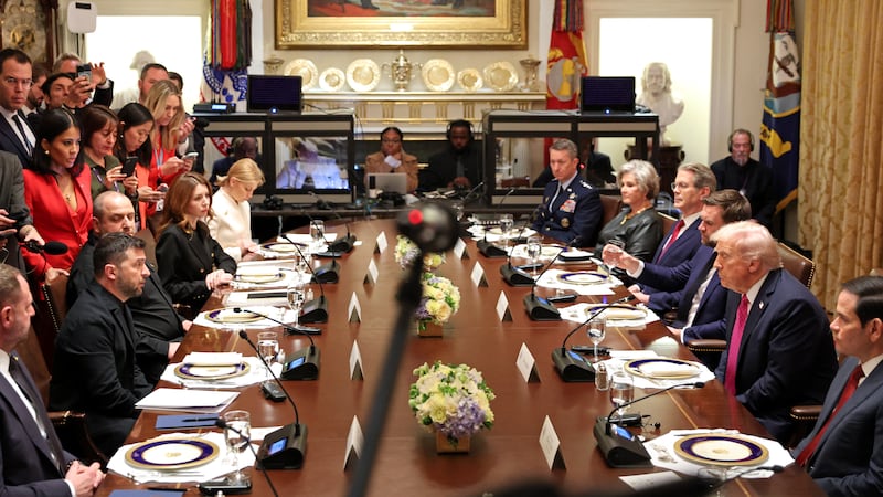 Castronuova (far left) stands behind Zelensky during his White House meeting with President Trump on Friday. Zelensky has asked for new weapons to fight Russia.