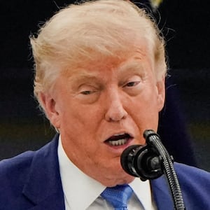 U.S. President Donald Trump delivers a speech as he stands in front of the VC-25B aircraft gifted by Qatar that will be used as Air Force One, at Joint Base Andrews, Maryland, U.S., June 19, 2026.