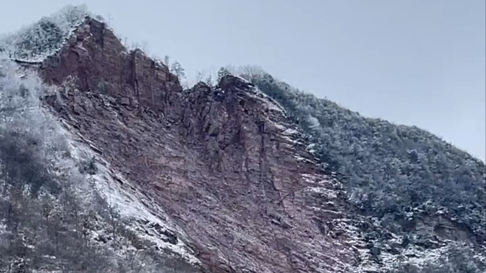 A view of a landslide in Liangshui Village, Yunnan province, China, where multiple people are feared dead.