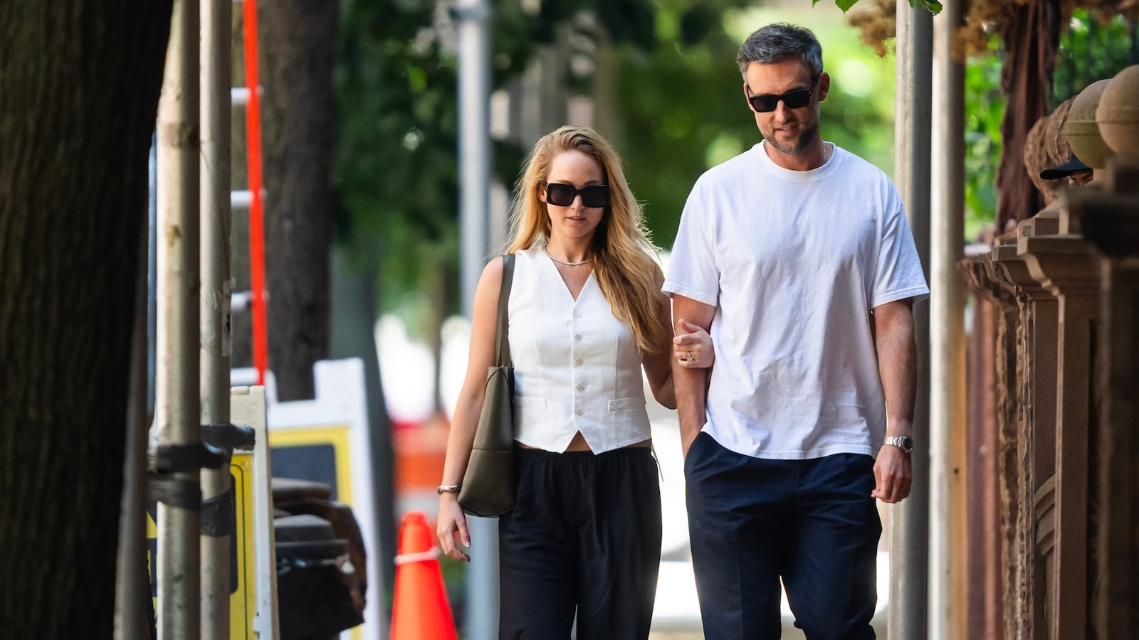 NEW YORK, NEW YORK - AUGUST 22: Jennifer Lawrence (L) and Cooke Maroney are seen in the Upper West Side on August 22, 2023 in New York City.