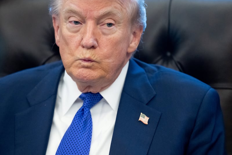 President Donald Trump speaks to the press about a critical minerals stockpile with $12 billion in initial funding, as Washington seeks to lower reliance on China for rare earths and other resources, in the Oval Office of the White House in Washington, DC, on February 2, 2026.