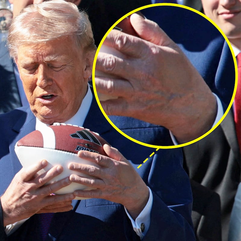 President Donald Trump shakes hands with Head Coach Curt Cignetti during an event to celebrate the 2026 Football National Champion Indiana Hoosiers football team on the South Lawn of the White House on May 11, 2026 in Washington, DC.