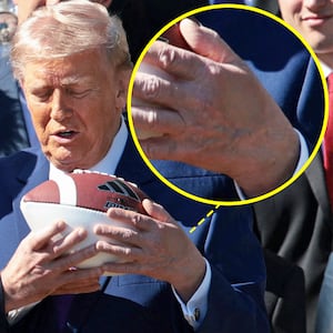 President Donald Trump shakes hands with Head Coach Curt Cignetti during an event to celebrate the 2026 Football National Champion Indiana Hoosiers football team on the South Lawn of the White House on May 11, 2026 in Washington, DC.