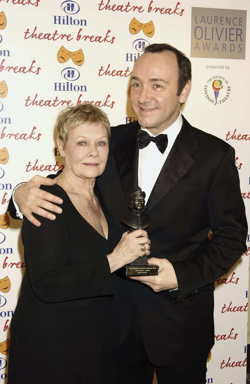LONDON - FEBRUARY 22:  Dame Judi Dench and Kevin Spacey attend the 2004 Laurence Olivier Awards at The Park Lane Hilton Hotel on February 22, 2004 in London.
