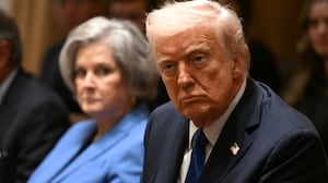 President Donald Trump, pictured with Chief of Staff Susan Wiles in March, defended her as "fantastic" despite her unfiltered observations to Vanity Fair.