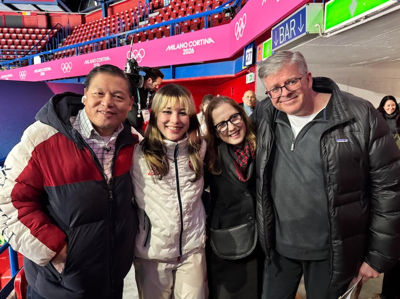 Arthur Liu and Alysa Liu with family friends.