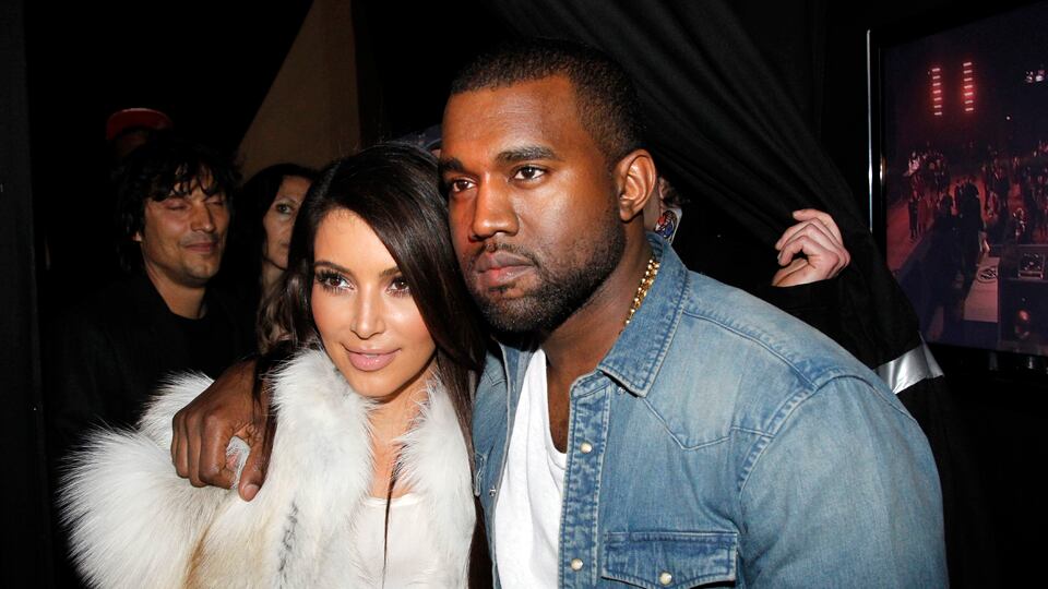cheats/2012/04/05/kanye-west-and-kim-kardashian-dating-go-to-the-hunger-games/kardashian-kayne-dating-cs_l0xfhe