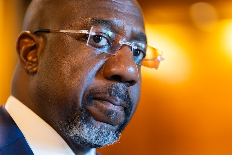 WASHINGTON, DC - JULY 13: U.S. Sen. Raphael Warnock (D-GA) departs from the Senate Chambers during a vote in the U.S. Capitol Building on July 13, 2026 in Washington, DC. U.S. Senators faced questions from reporters after two weeks of recess and being in their home states. (Photo by Finn Gomez/Getty Images)
