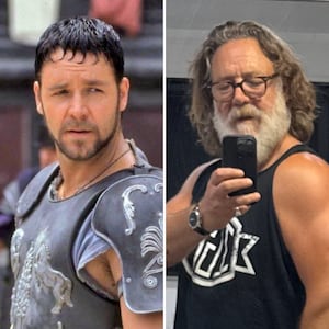 On left, Russell Crowe as Maximus in "Gladiator" (2000); on right, the actor flexes in the mirror in a 2026 selfie with his son.