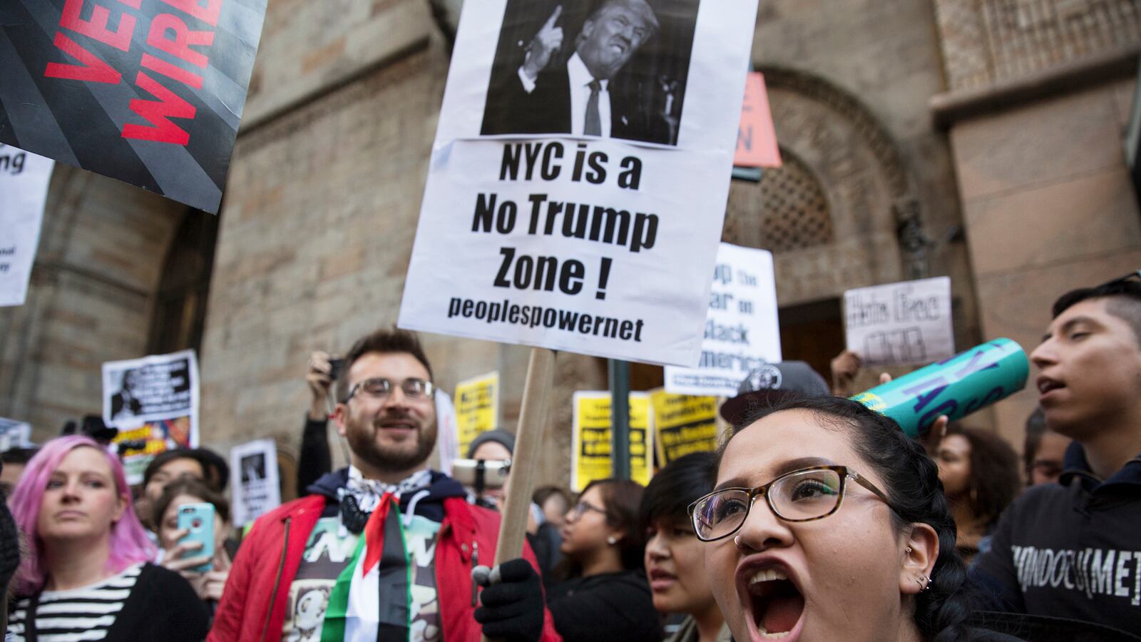 articles/2016/04/15/this-isn-t-donald-trump-s-new-york-and-the-side-entrance-proves-it/160414-daly-trump-protest-tease_gidom8