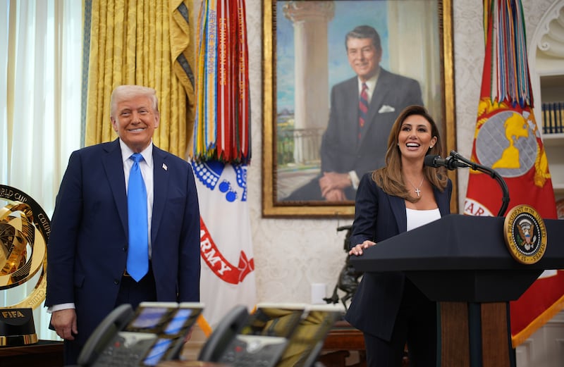 WASHINGTON, DC - MARCH 28: U.S. President Donald Trump (L) listens as White House Presidential Counselor Alina Habba delivers remarks before being sworn in as the interim U.S. Attorney for New Jersey in the Oval Office at the White House on March 28, 2025 in Washington, DC. Habba is a former personal attorney for President Donald Trump. (Photo by Andrew Harnik/Getty Images)