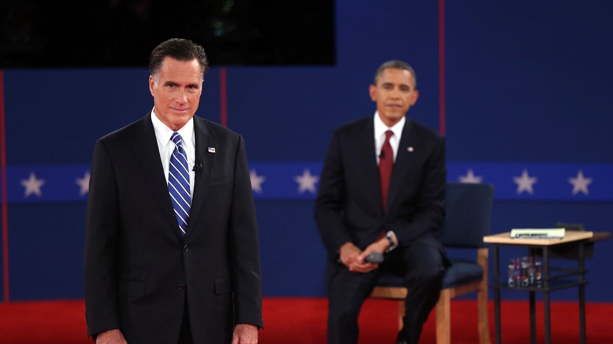 articles/2012/10/19/ground-game-obama-campaign-opens-up-a-big-lead-in-field-offices/debate-romney-looks-obama-listens_byrcrz