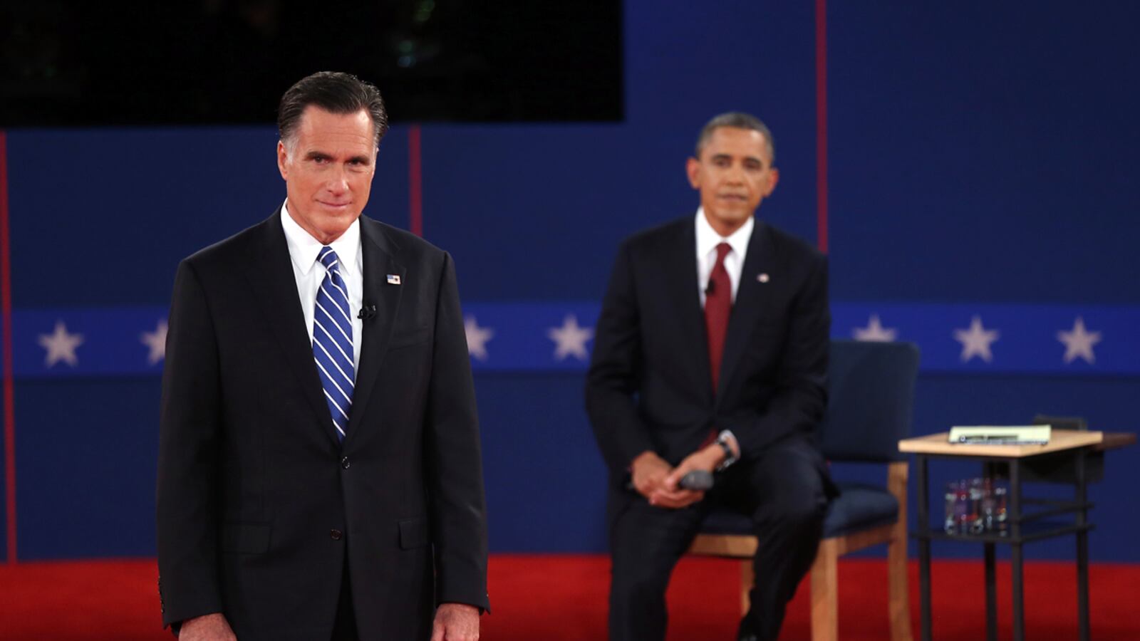 articles/2012/10/19/ground-game-obama-campaign-opens-up-a-big-lead-in-field-offices/debate-romney-looks-obama-listens_byrcrz