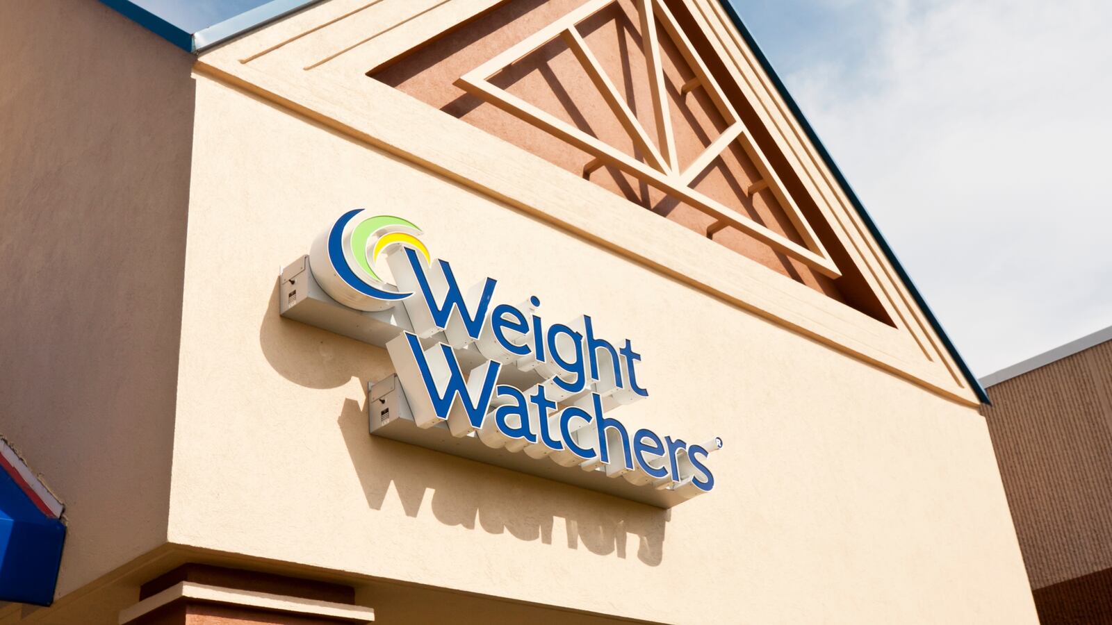 Sign at Weight Watchers business in a strip mall.