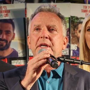 US special envoy Steve Witkoff (C) speaks as US businessman Jared Kushner (L) and his wife Ivanka Trump (R) look on during a gathering at Hostages Square in Tel Aviv on October 11, 2025. Israel has agreed to a truce plan proposed by US President Donald Trump, and on October 10 pulled its troops back from several areas of Gaza, setting in motion a 72-hour timeline for the release of hostages held by Hamas two years after the Palestinian militant group's October 7, 2023, attack that triggered a counteroffensive killing more than 67,000 Palestinians. (Photo by Jack GUEZ / AFP) (Photo by JACK GUEZ/AFP via Getty Images)