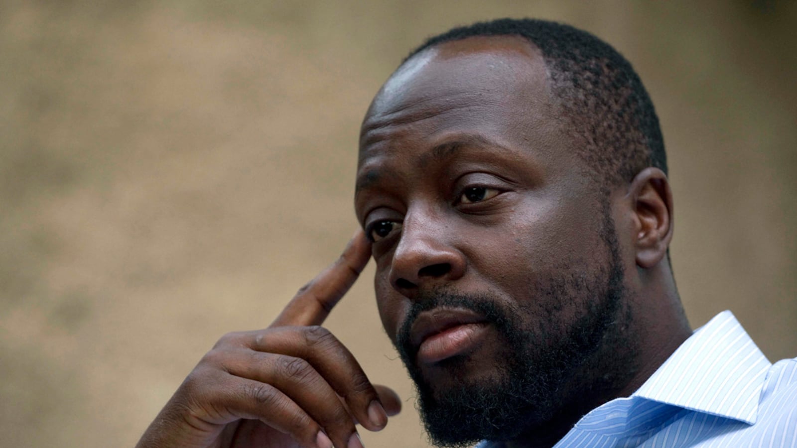 articles/2012/09/20/wyclef-jean-autobiography-lauryn-hill-the-fugees-more/leon-jean-juicy-bits-tease_xd16oz