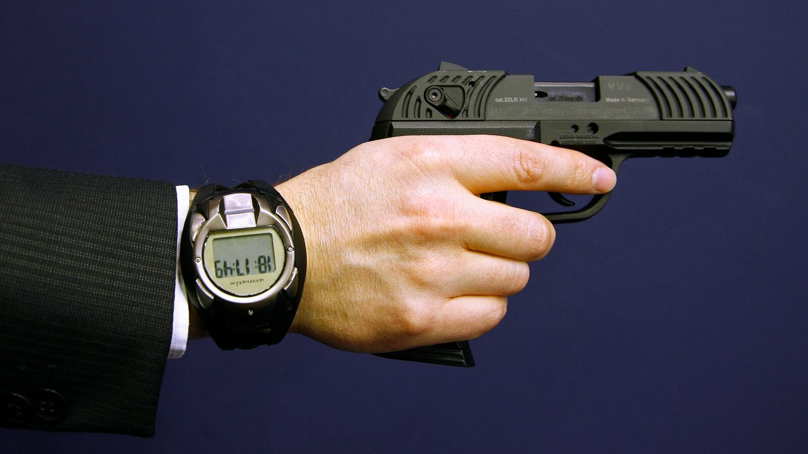 A man holds a prototype of a smart gun by Armatix during the International Guns Exhibition 'IWA & OutdoorClassics' in Nuremberg March 13, 2009.