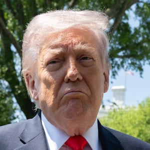 US President Donald Trump speaks with the media prior to departing from the South Lawn of the White House in Washington, DC, May 1, 2026. Trump is going to Florida to speak at an event at The Villages and to attend the Forum Club of the Palm Beaches dinner. (Photo by SAUL LOEB / AFP via Getty Images)