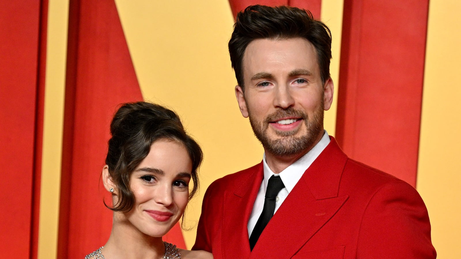 Alba Baptista and Chris Evans attend the 2024 Vanity Fair Oscar Party.