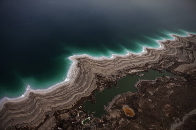 articles/2013/12/11/a-terrible-horrible-no-good-idea-for-israeli-palestinian-jordanian-cooperation/dead-sea-sinkholes-openz_smpsjw