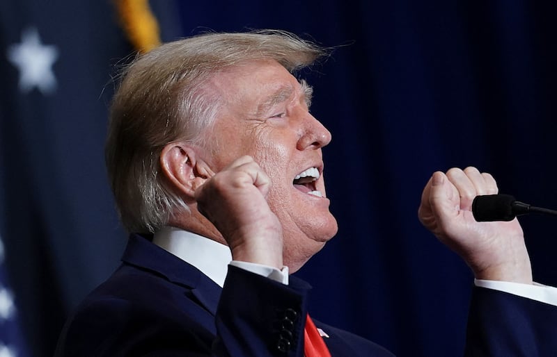 Former U.S. President Donald Trump  mocks transgender athletes during remarks at the America First Policy Institute America First Agenda Summit