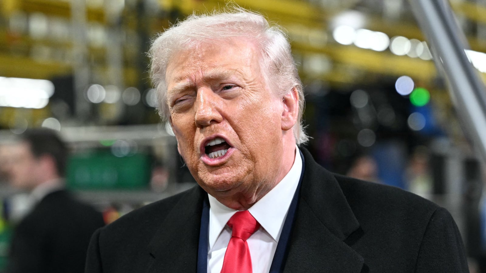 President Donald Trump appeared to flip off a worker who called him a pedophile during a visit to the Ford Motor Company's River Rouge complex in Dearborn, Michigan, on January 13, 2026.