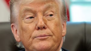 WASHINGTON, DC - MAY 06: U.S. President Donald Trump looks on during an event in the Oval Office of the White House on May 06, 2026 in Washington, DC. Trump was joined by UFC fighters to talk about the June 14th UFC Freedom 250 match to be held outside the White House. (Photo by Anna Moneymaker/Getty Images)