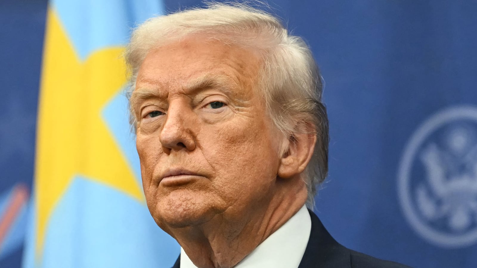 US President Donald Trump attends the signing ceremony of a peace deal with the President of Rwanda Paul Kagame and the President of the Democratic Republic of the Congo Felix Tshisekedi