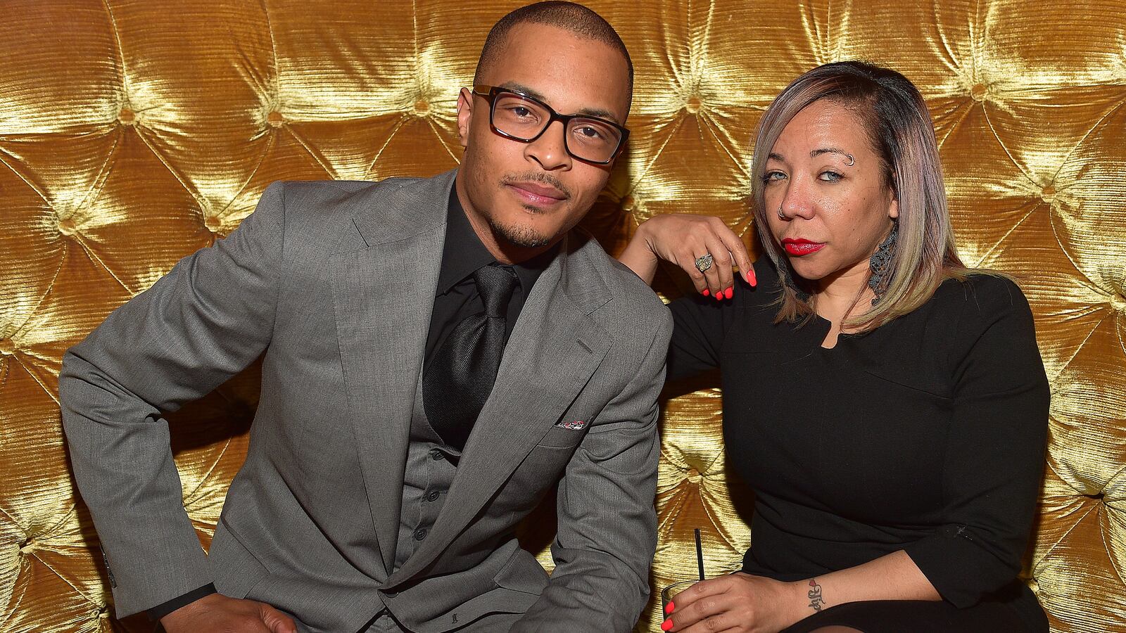 Clifford 'T.I.' Harris and Tameka 'Tiny' Harris attend 925 Scales Ribbon Cutting Ceremony at 925 Scales on March 27, 2015 in Atlanta, Georgia.