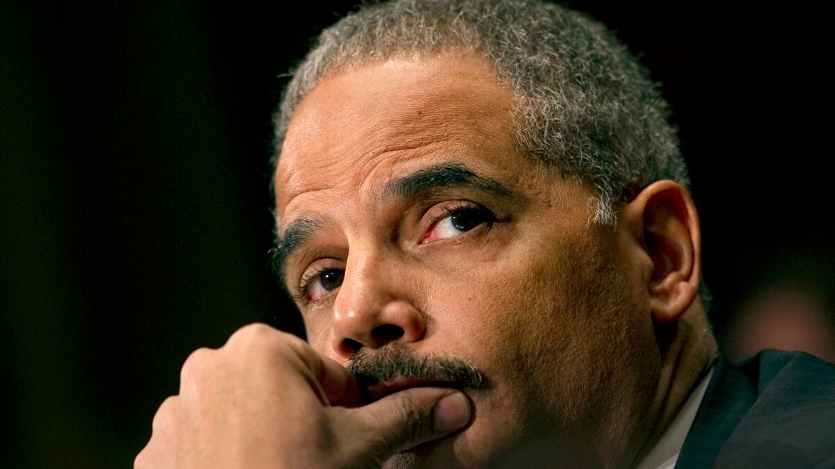 articles/2011/12/08/attorney-general-eric-holder-faces-heat-on-bungled-gun-sting/eric-holder-hearing-roston_rpflws