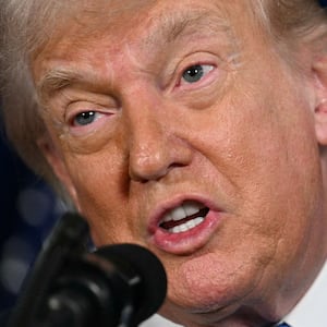 US President Donald Trump speaks to the press following US military actions in Venezuela, at his Mar-a-Lago residence in Palm Beach, Florida, on January 3, 2026. President Trump said Saturday that US forces had captured Venezuelan leader Nicolas Maduro after launching a "large scale strike" on the South American country. (Photo by Jim WATSON / AFP via Getty Images)