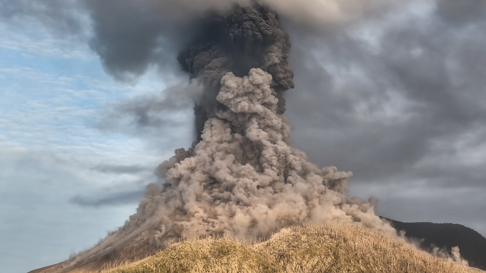 Mount Lewotobi Laki-Laki erupts as seen from Pululera village, East Nusa Tenggara, on August 18, 2025.