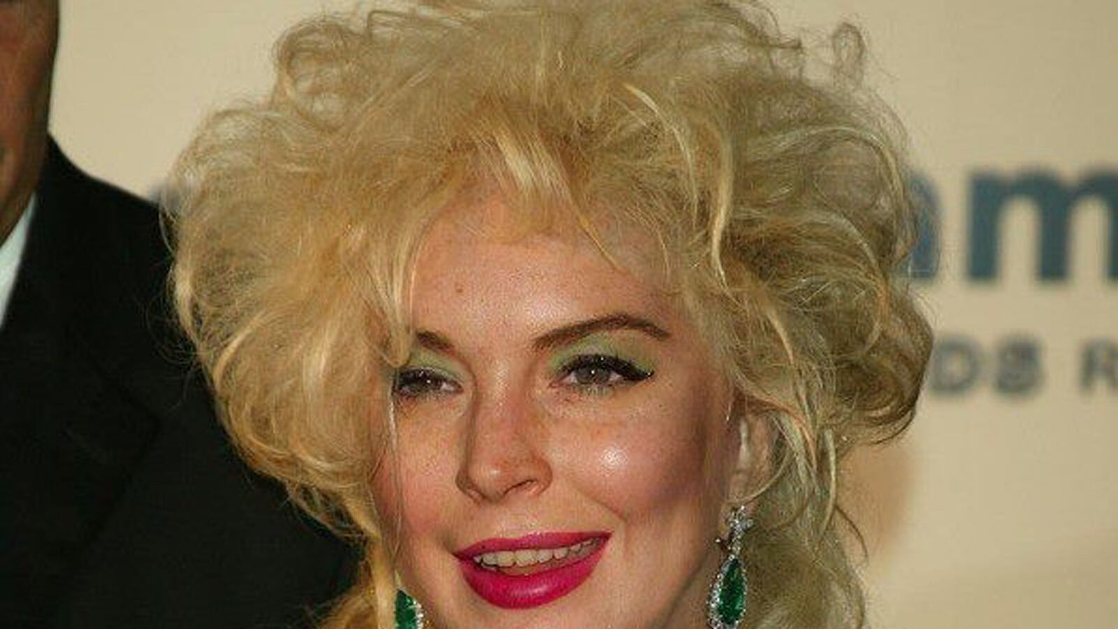 articles/2014/07/24/artist-gives-lohan-the-natural-look/140724-jjones-celeb-make-unders-tease-new_ql5pq9