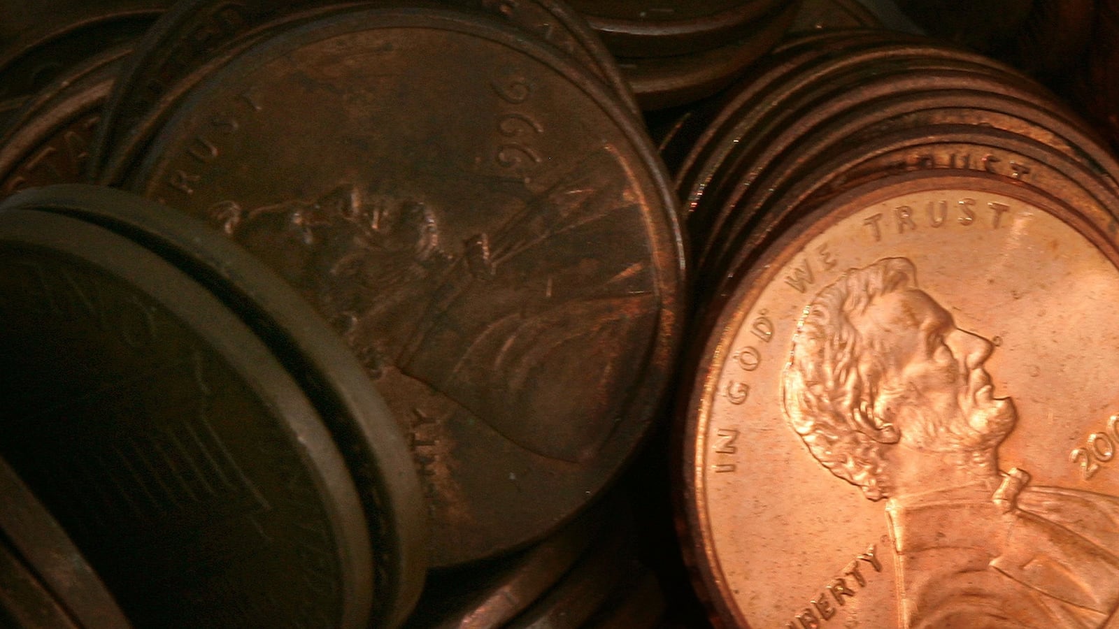 DES PLAINES, IL - JULY 06: Pennies lay in a pile July 6, 2006 in Des Plaines, Illinois. According to the U.S. Mint says a penny costs more to make than it's worth, 1.2 cents, prompting some to call for its demise.
