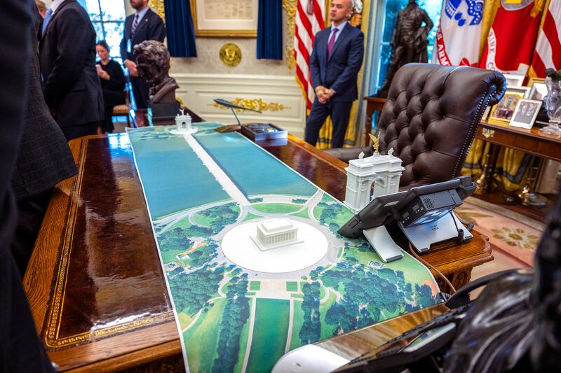 A plan for an arch across from the Lincoln Memorial is seen on the Resolute Desk as US President Donald Trump meets with Finnish President Alexander Stubb and Prime Minister Petteri Orpo in the Oval Office of the White House in Washington, DC, on Oct. 9, 2025.