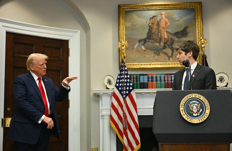 US President Trump gestures as CEO of Open AI Sam Altman speaks in the Roosevelt Room at the White House.